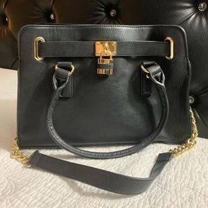 Black handbag with Gold Lock and Chain